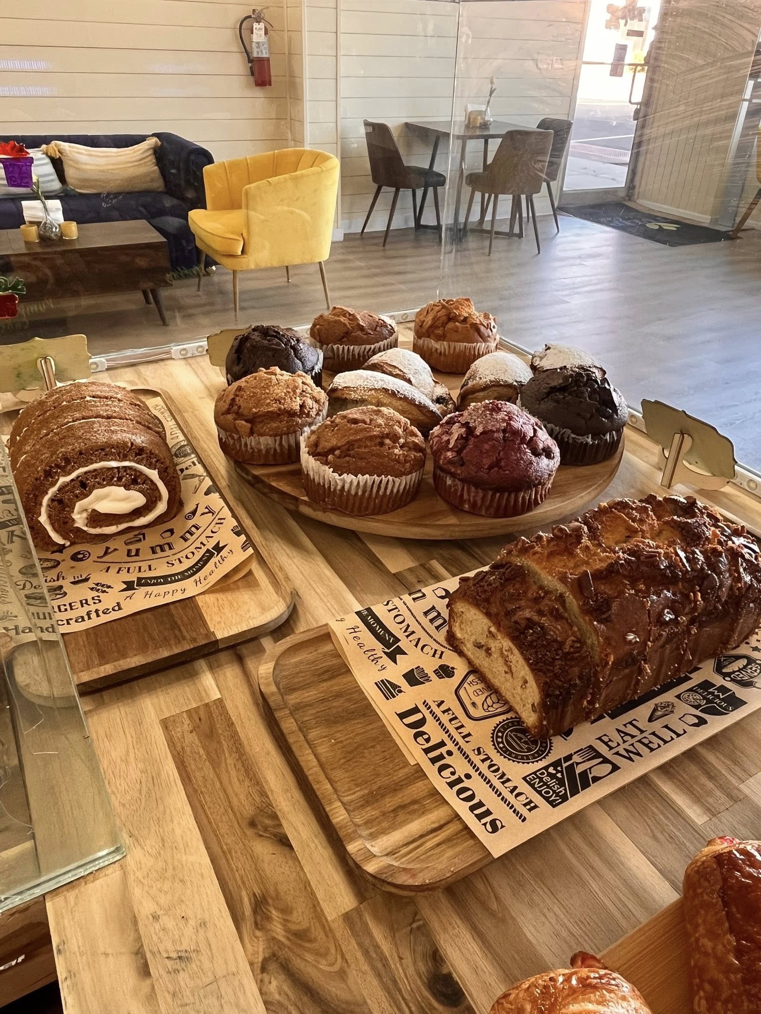 Fresh muffins and pastries display at Tulip Cafe